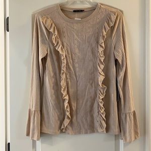 Beige embroidered ruffle front top